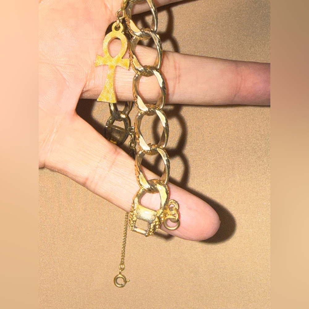 Vintage MONET gold tone link bracelet with Egyptian symbol: Ankh (☥),